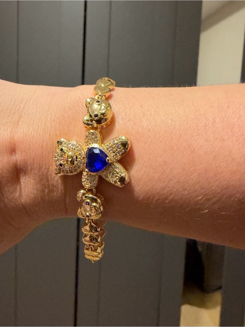 Gold-Tone Bear Bracelet with Blue Heart Charm
